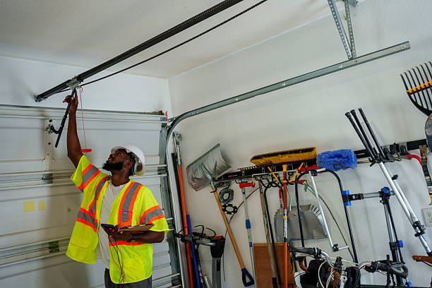 Professional Garage Door Panel Replacement technician working in Washington County County, ME